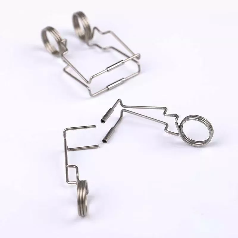 Gimnasio komertzialeko erabilera astuneko zikloek arriskuan jar dezakete Power Systems Olympic Spring Barbell Collars mundu errealeko segurtasun-errendimendua?